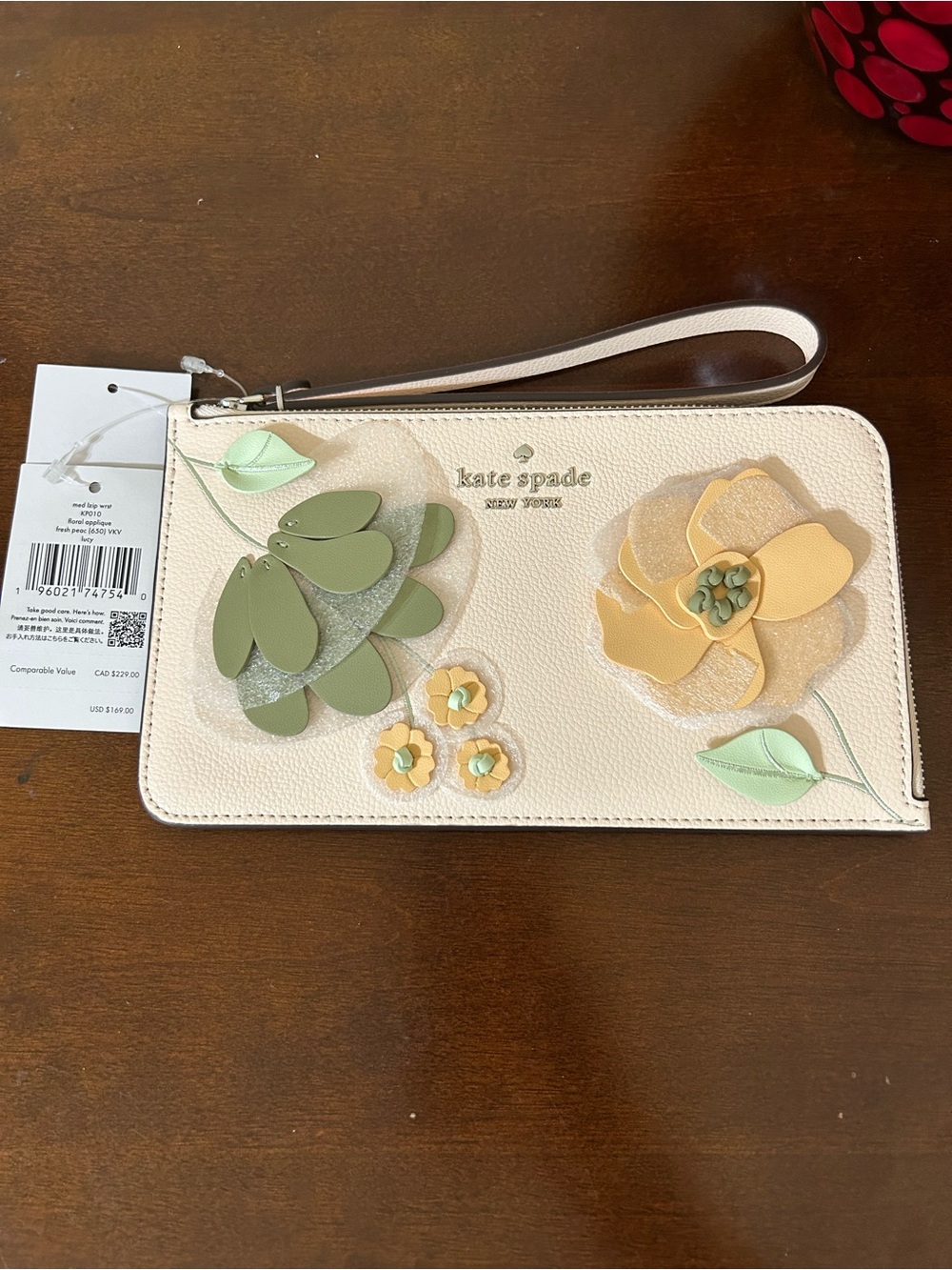 kate spade Lucy Floral Wristlet in Fresh Peach MSRP $169
